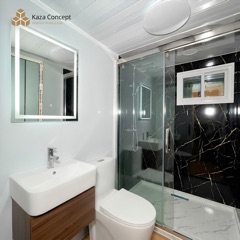 Salle de bain du KAZ Duplex : douche à l'italienne, vasque et WC
