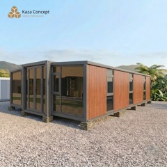 KAZ Pavillon vu de trois quarts : long bardage bois, larges baies vitrées et double porte vitrée